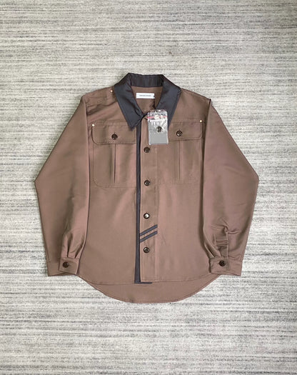 brown patchwork jacket by Kiko Kostadinov