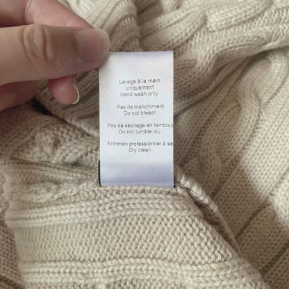 asymmetric knitted vest with multiple collars