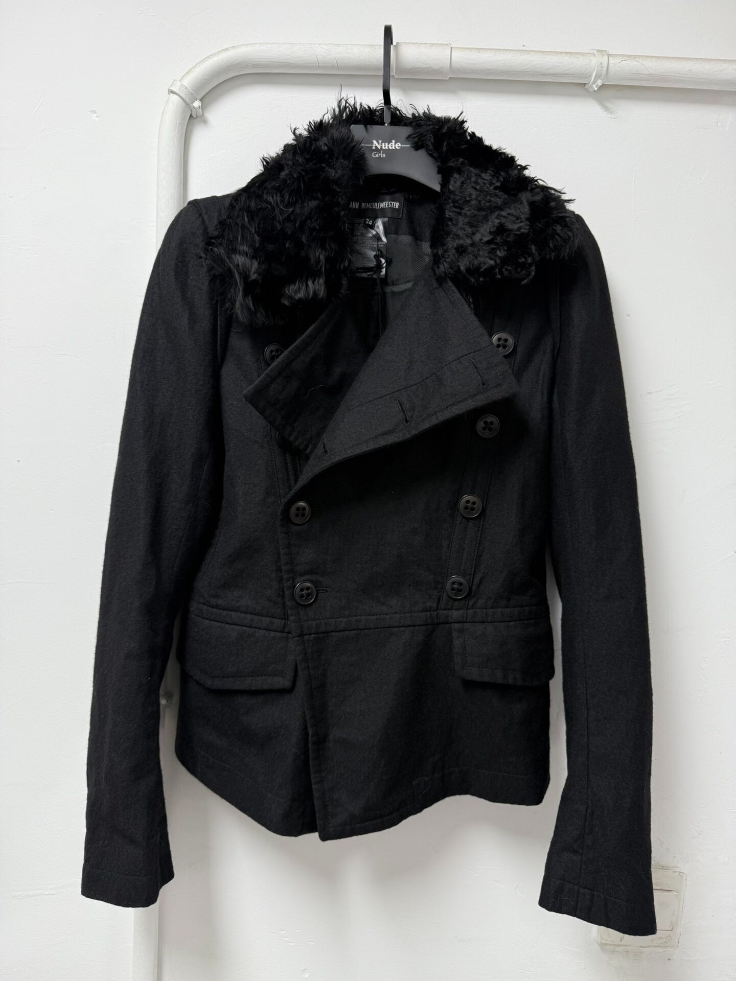 black double-breasted jacket with fur collar