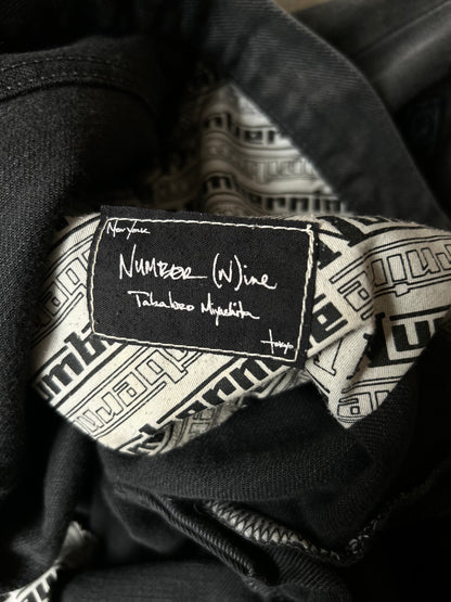 rebel patchwork denim pants by number nine