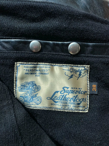 black leather biker jacket with detailed embellishments