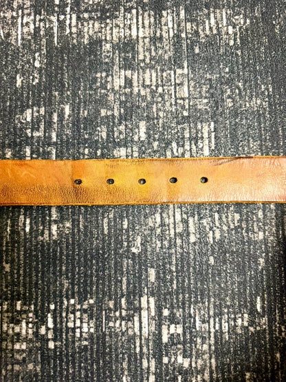 brown leather belt with gold buckle