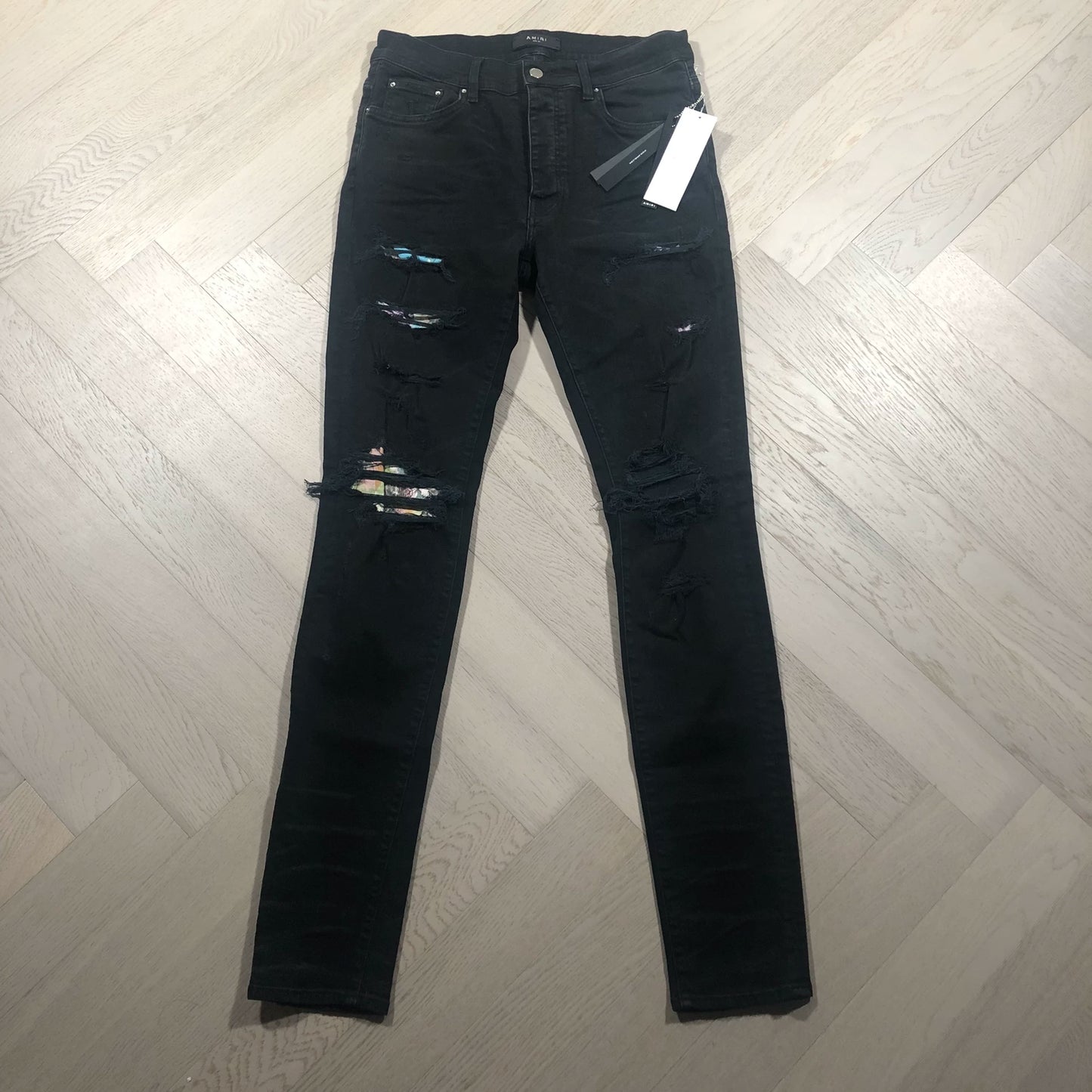 AMIRI Black Distressed Jeans with Floral Lining