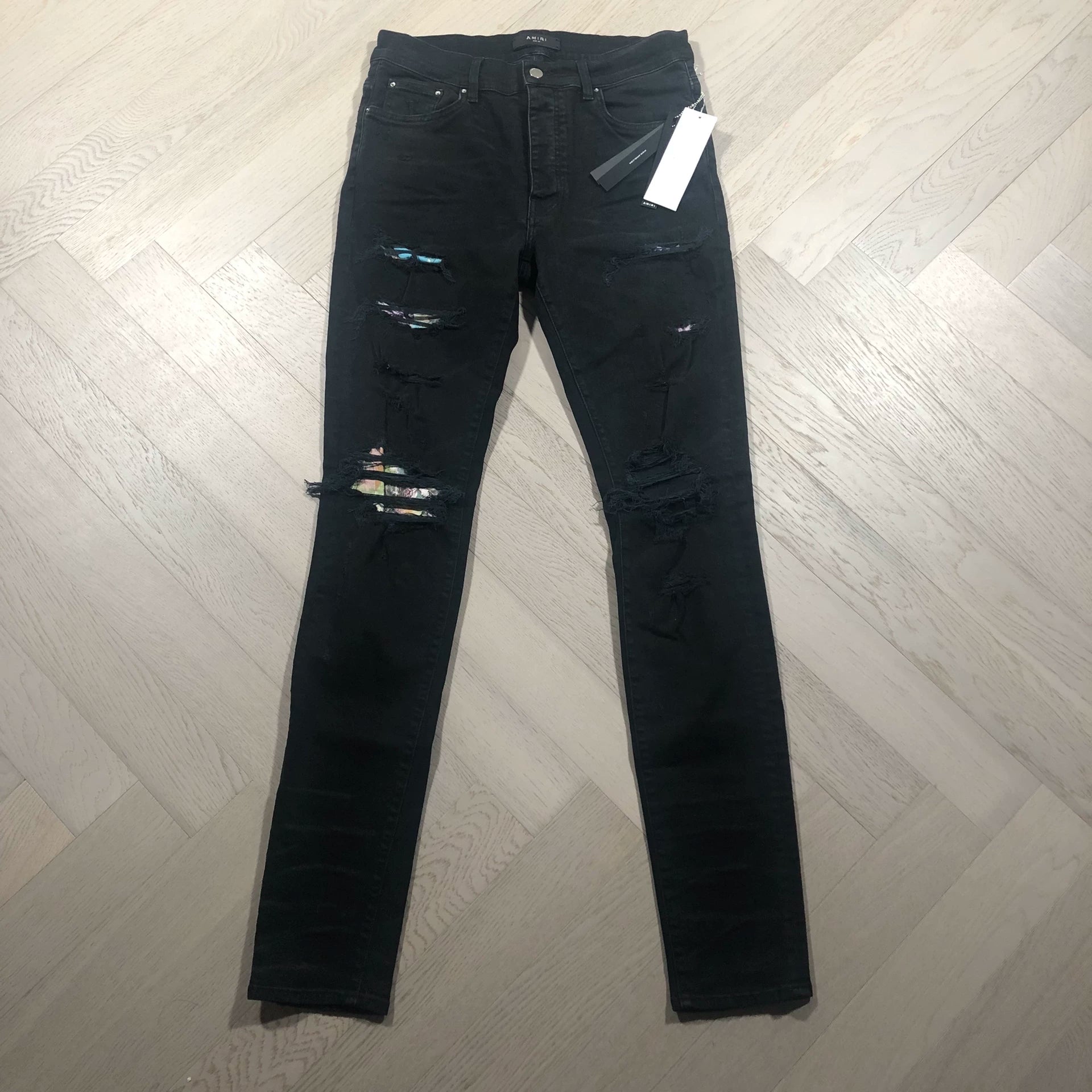 AMIRI Black Distressed Jeans with Floral Lining