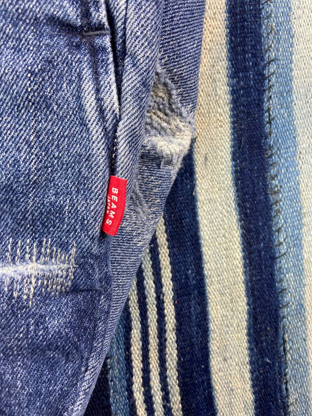 washed blue tapered denim pants for men