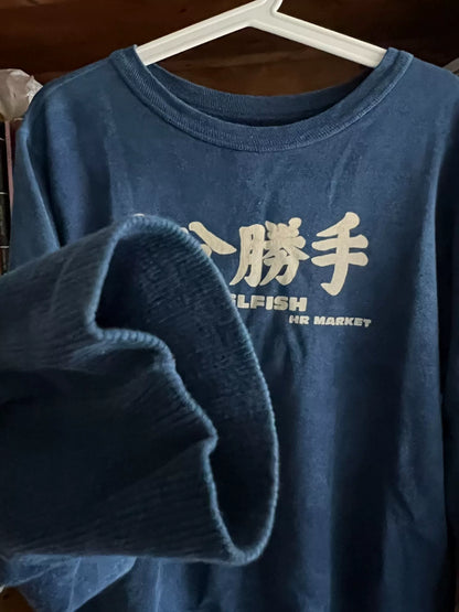 blue denim wash sweatshirt with text