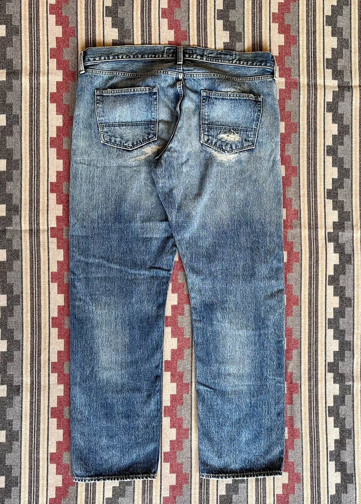 fdmtl slim fit denim distressed jeans