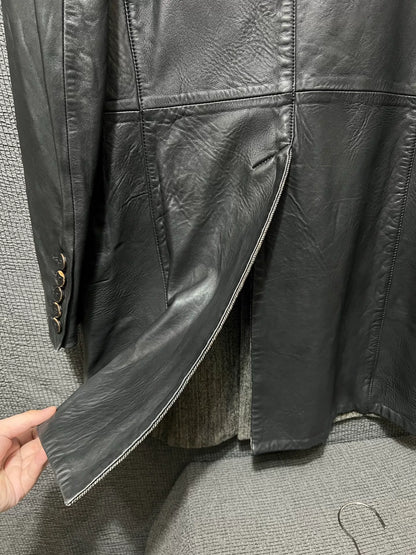 dark leather overcoat by isaac sellam experience