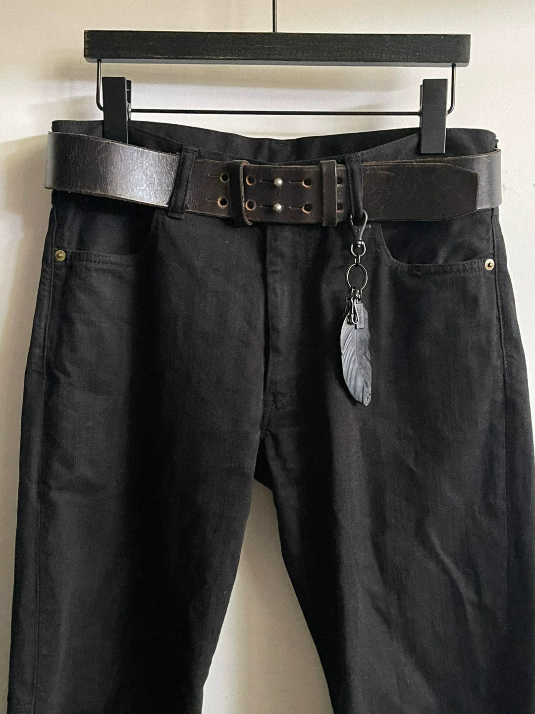 black denim pants with pocket detail