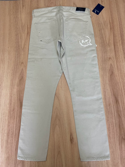 ivory corduroy pants with paint splatter