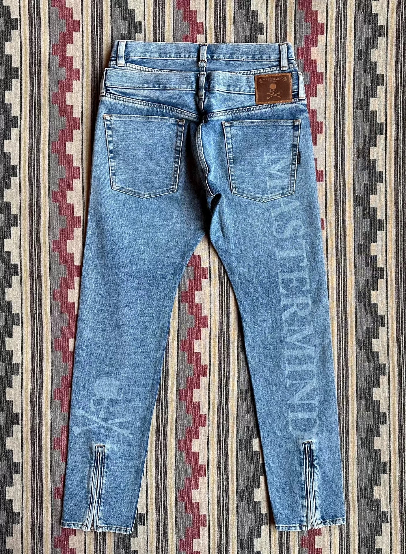 mastermind world skull embroidery denim pants