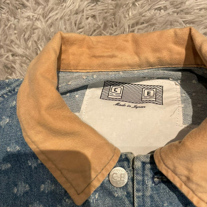 CE/CAVEMPT Distressed Denim Jacket