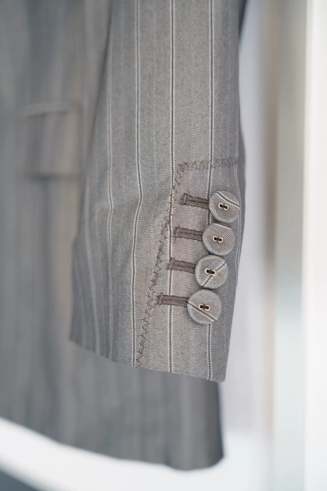 gray striped suit by Jean Paul Gaultier