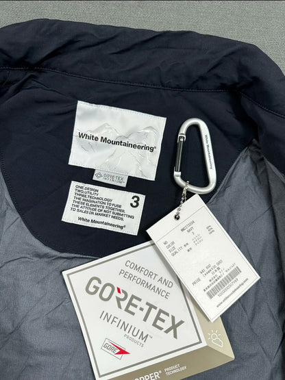 white mountaineering gore-tex coach jacket