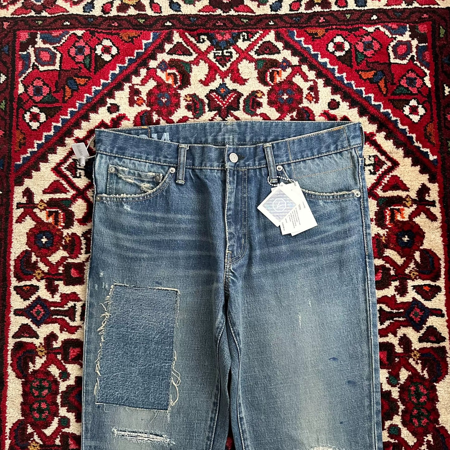visvim mud-dyed wide-leg jeans