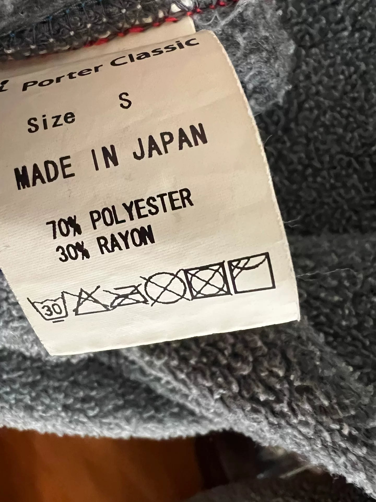 stylish gray fleece jacket with blue accents