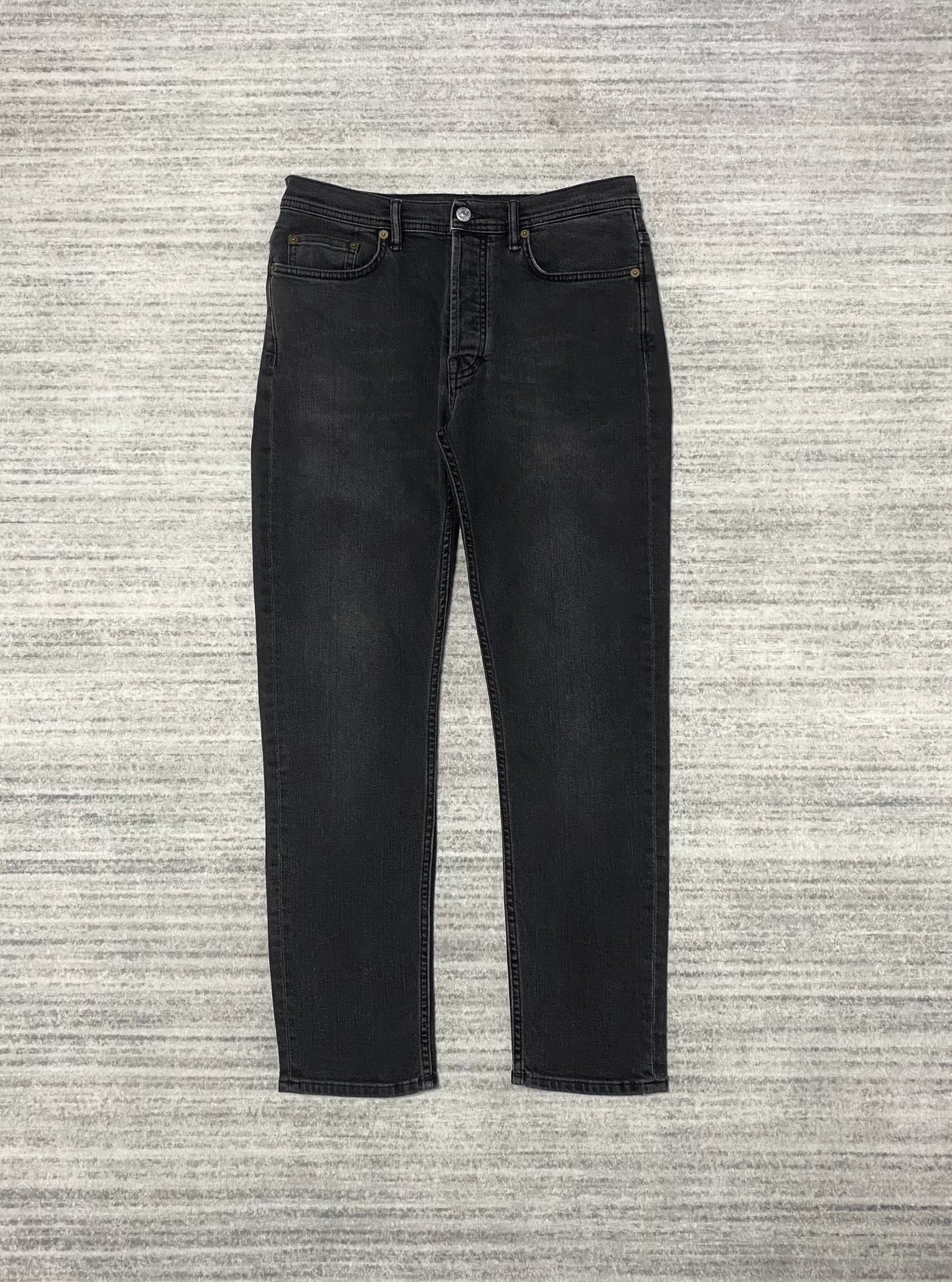 black slim-fit straight-leg jeans