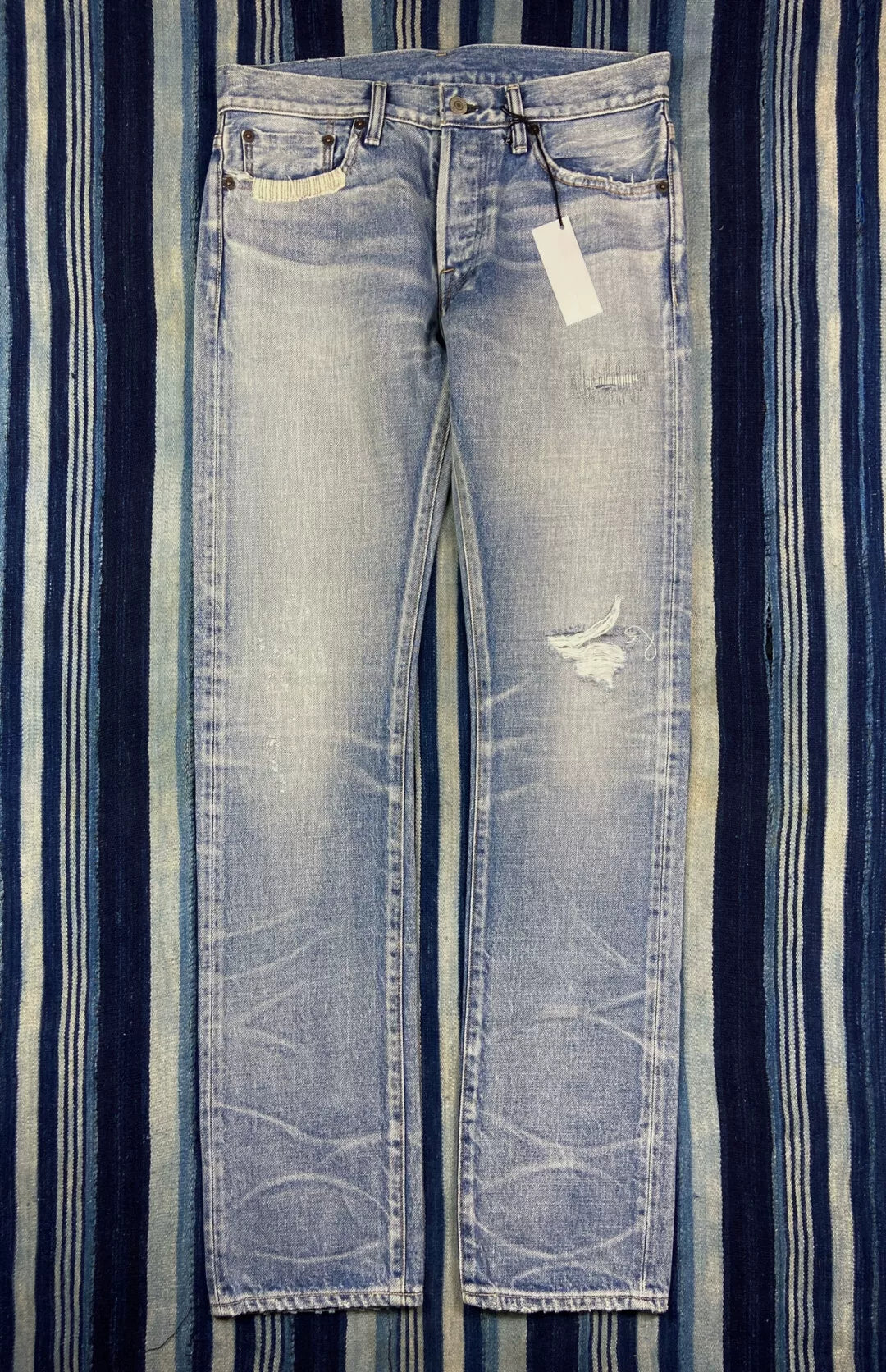 distressed raw wash denim jeans by fabric-brand&co