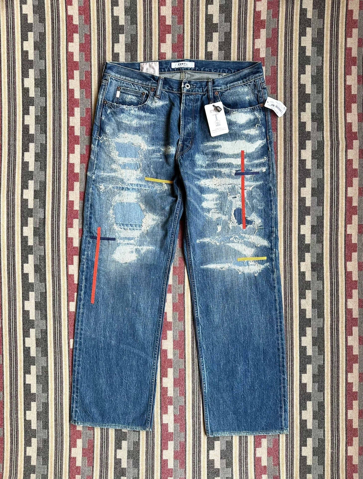 fdmtl classic fit red line distressed jeans