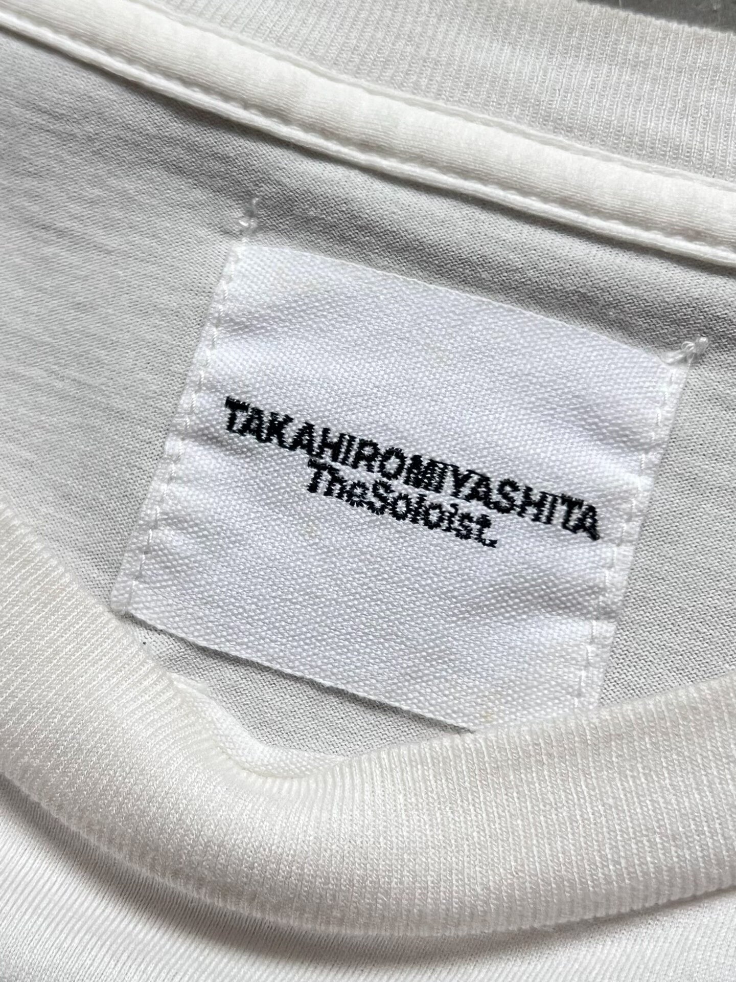 no borders collaboration graphic tee