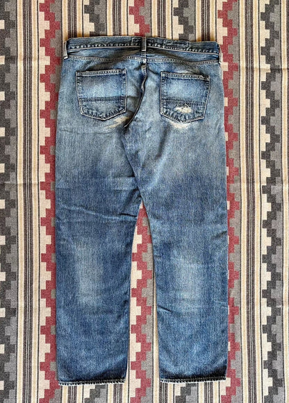 fdmtl slim fit distressed denim pants