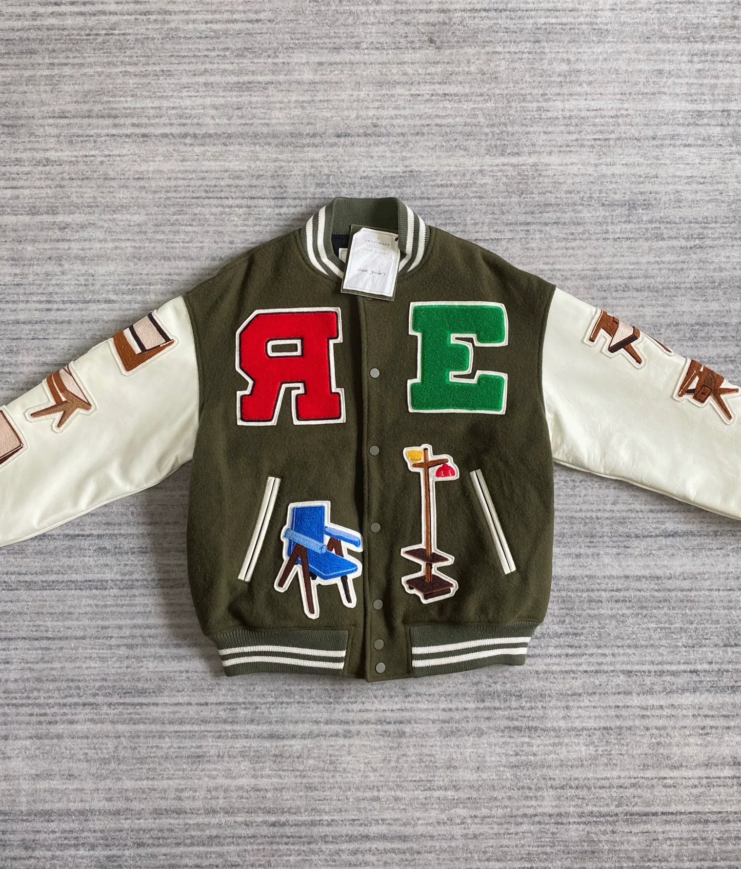 readymade baseball jacket with leather sleeves