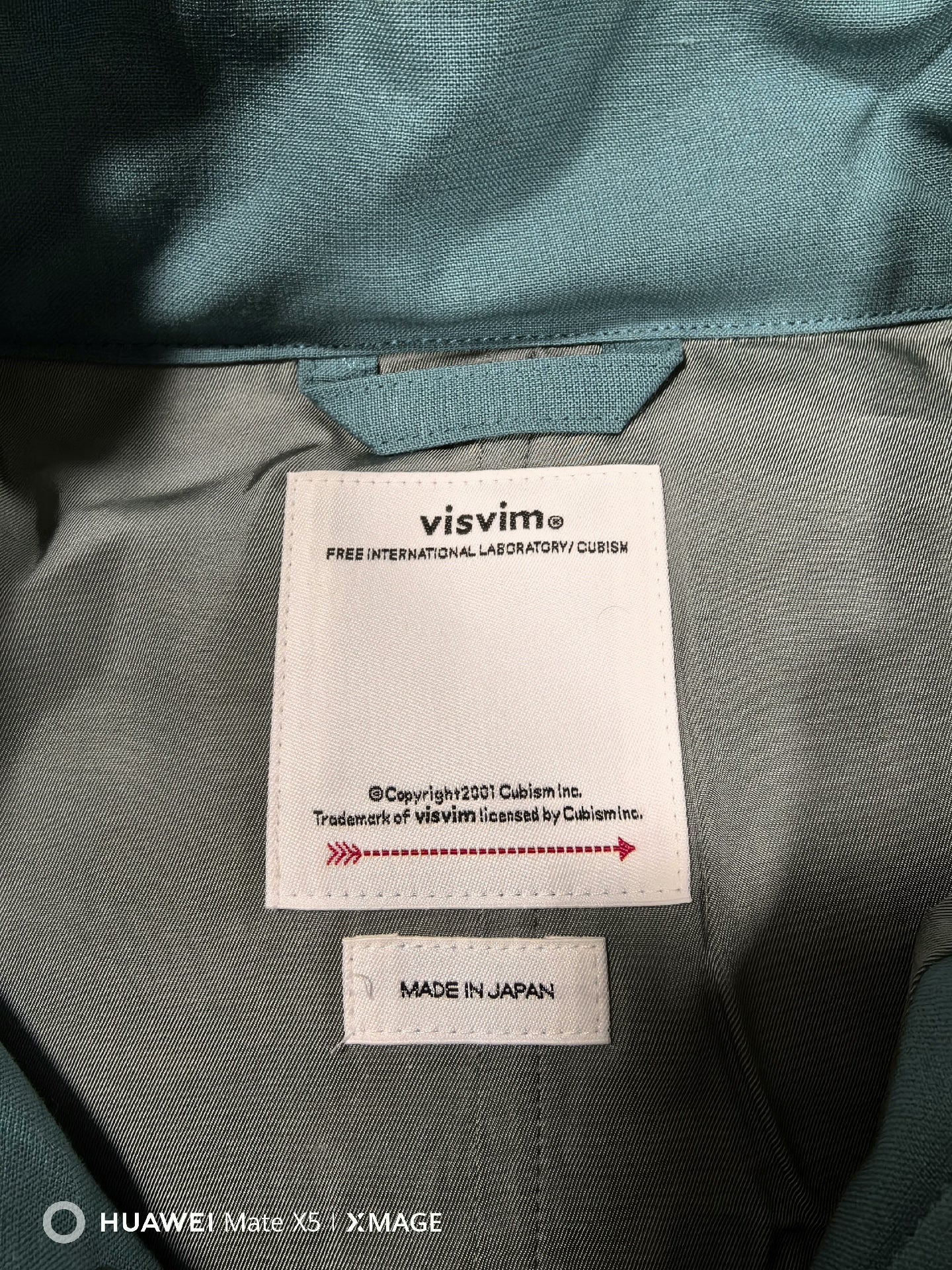 visvim ulmer down jacket in green hue