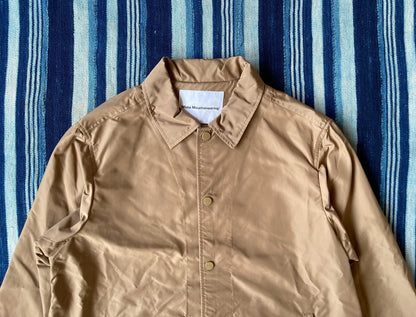 white mountaineering printed jacket