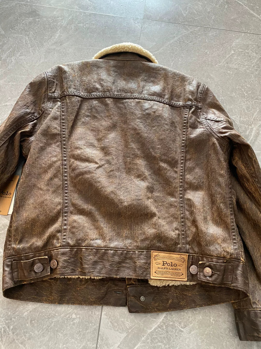 brown leather jacket with fur collar