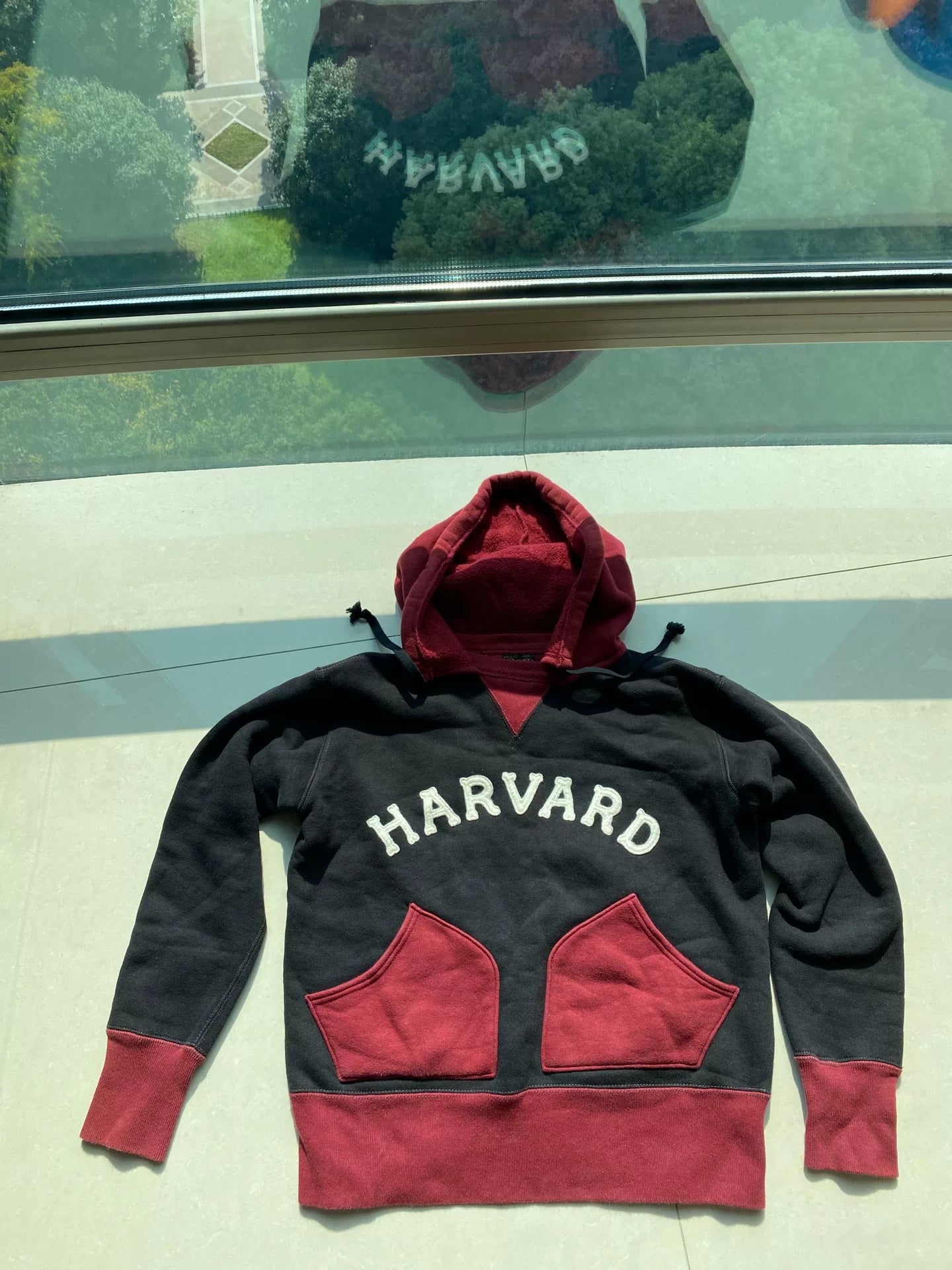 red and black hooded sweatshirt with pockets