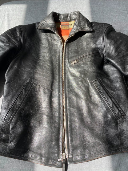 black leather jacket with snowflake design