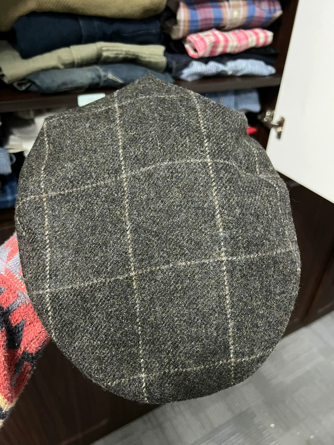 gray newsboy cap with plaid pattern