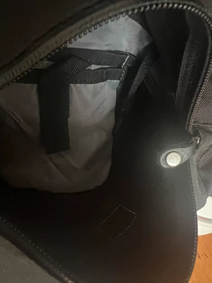 black roll-top backpack with multifunctional pockets