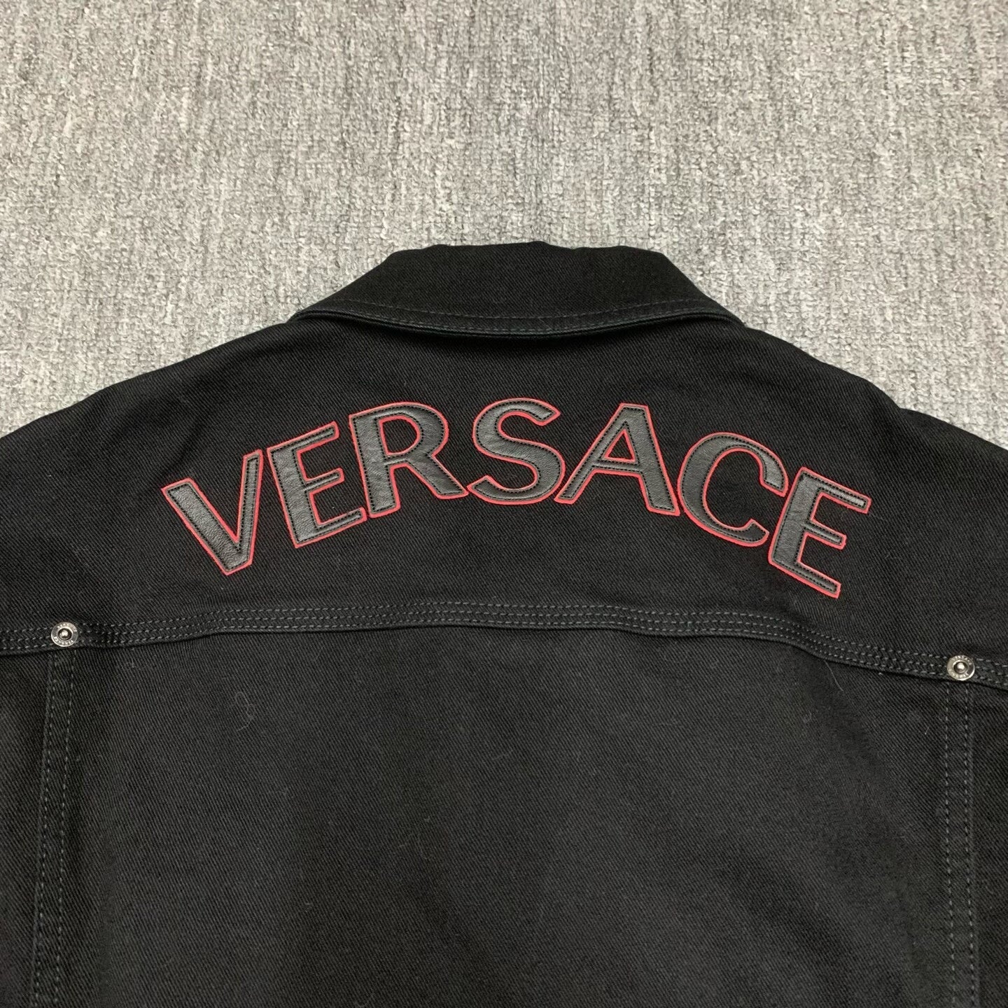 black short denim jacket with logo