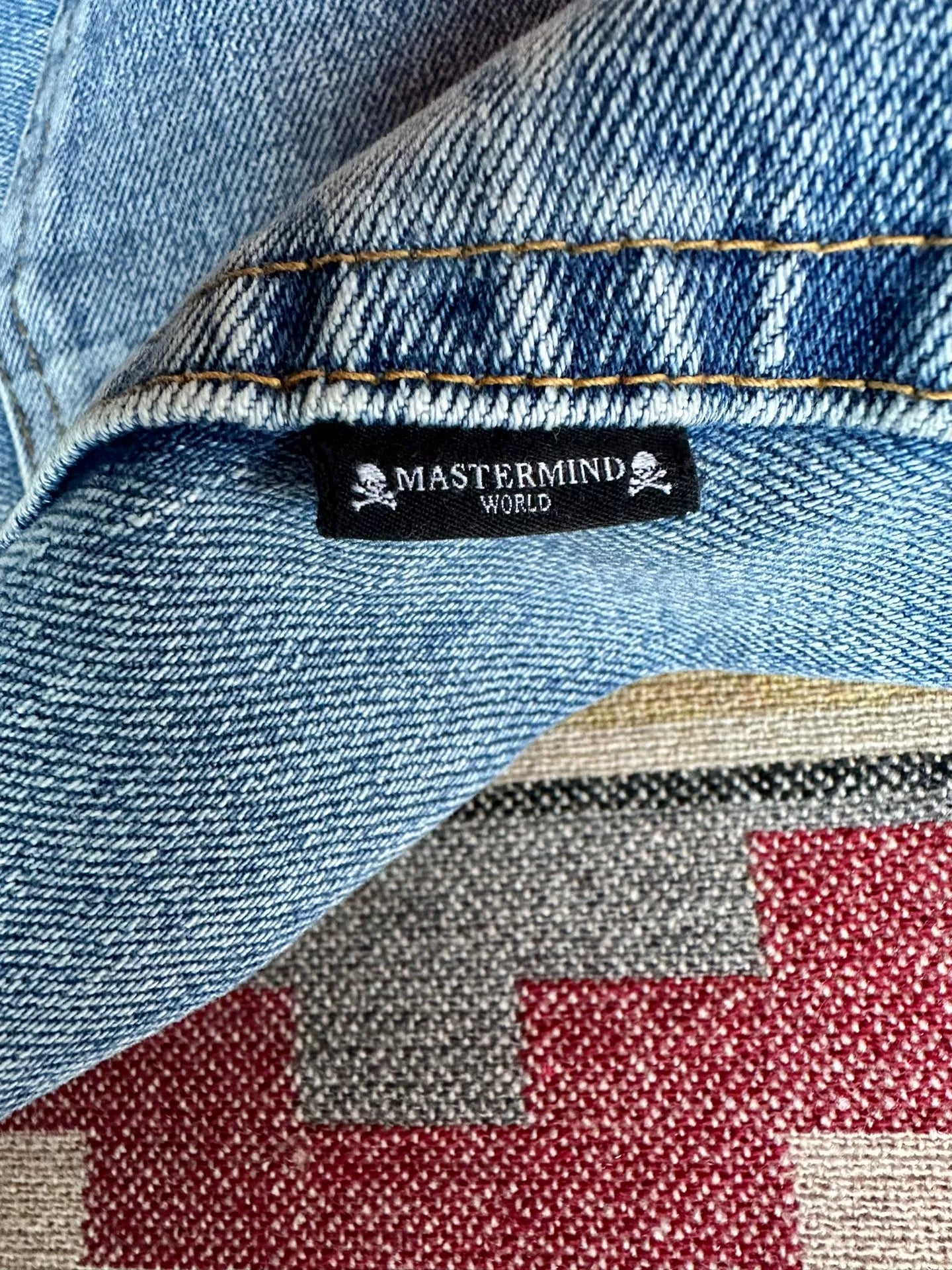 mastermind world skull embroidery denim pants