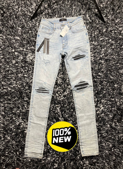 amiri mx1 distressed skinny jeans