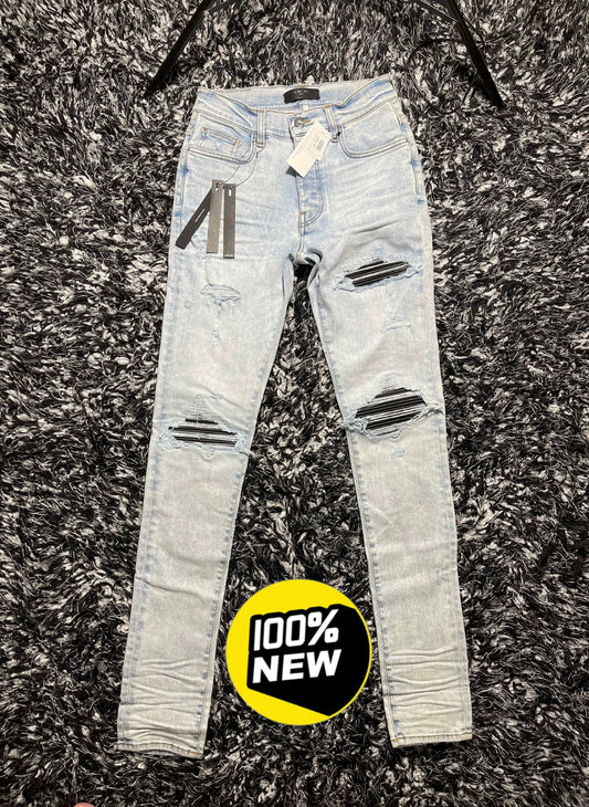 amiri mx1 distressed skinny jeans