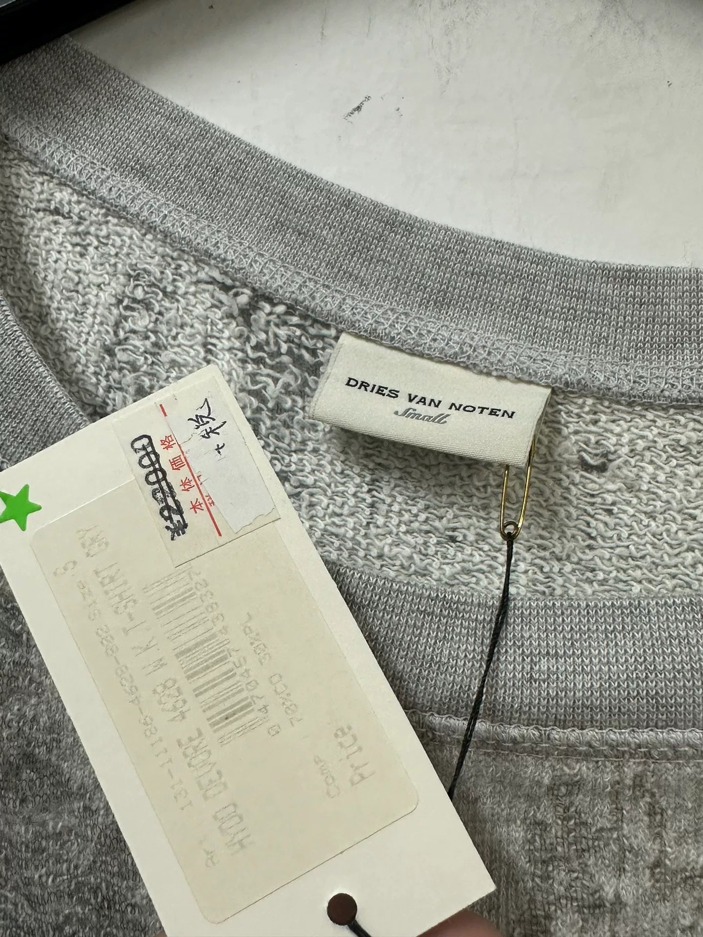 drapes laser-etched graphic short sleeve shirt