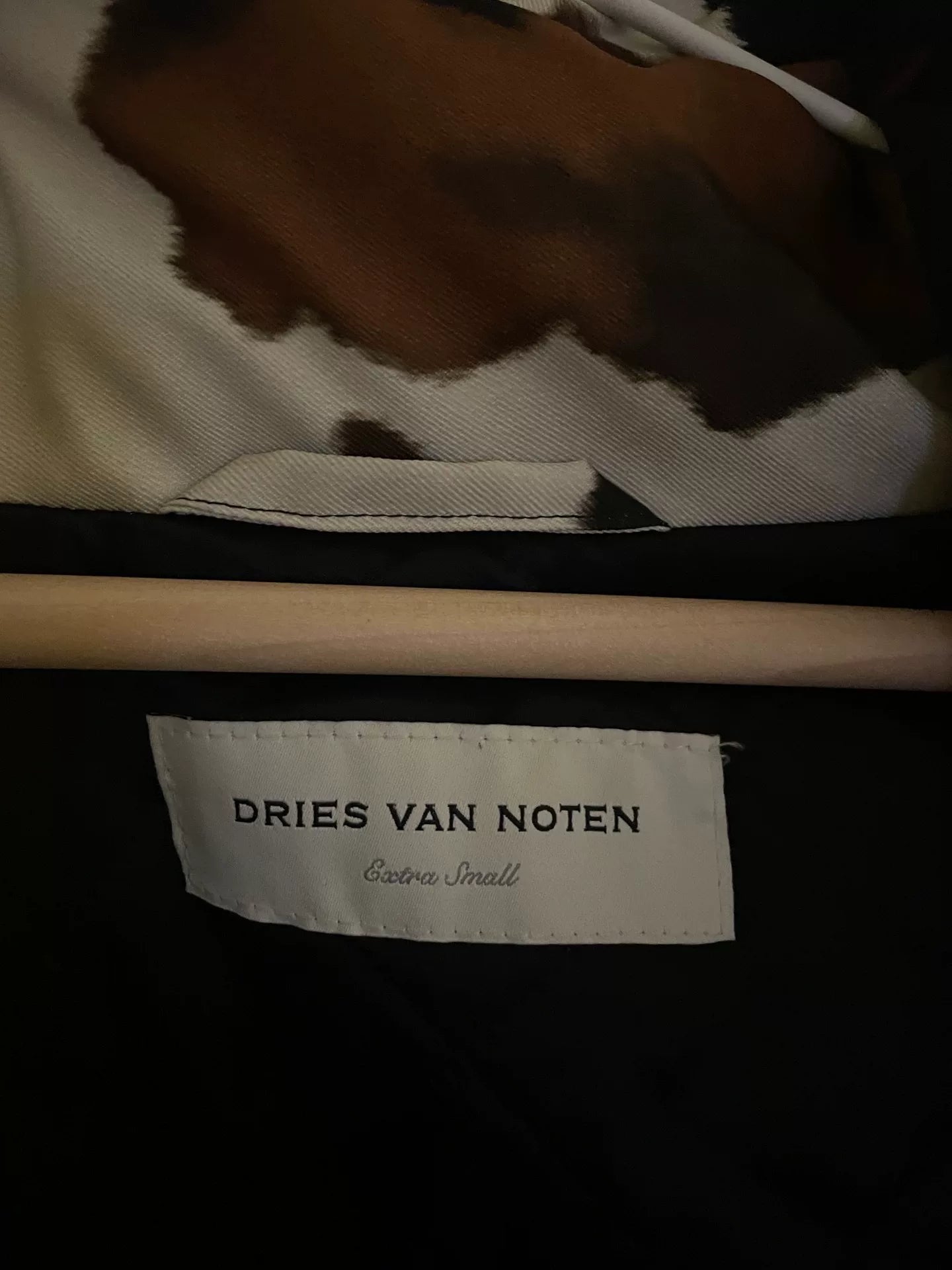 oversized black and white cow print coat