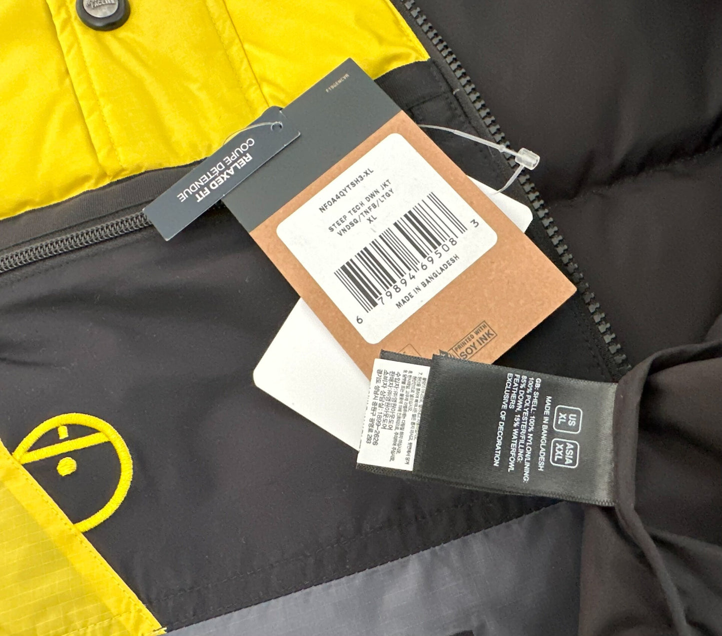 the north face steep tech down jacket