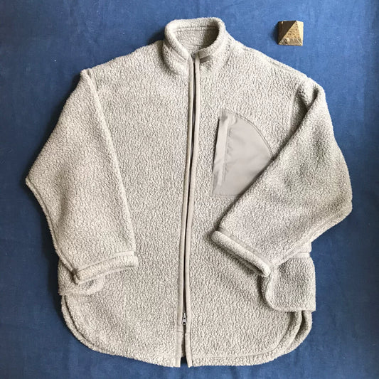 gray fleece jacket with zipper and pocket