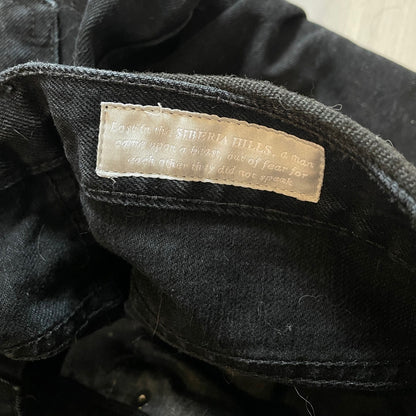 black studded straight-leg denim pants