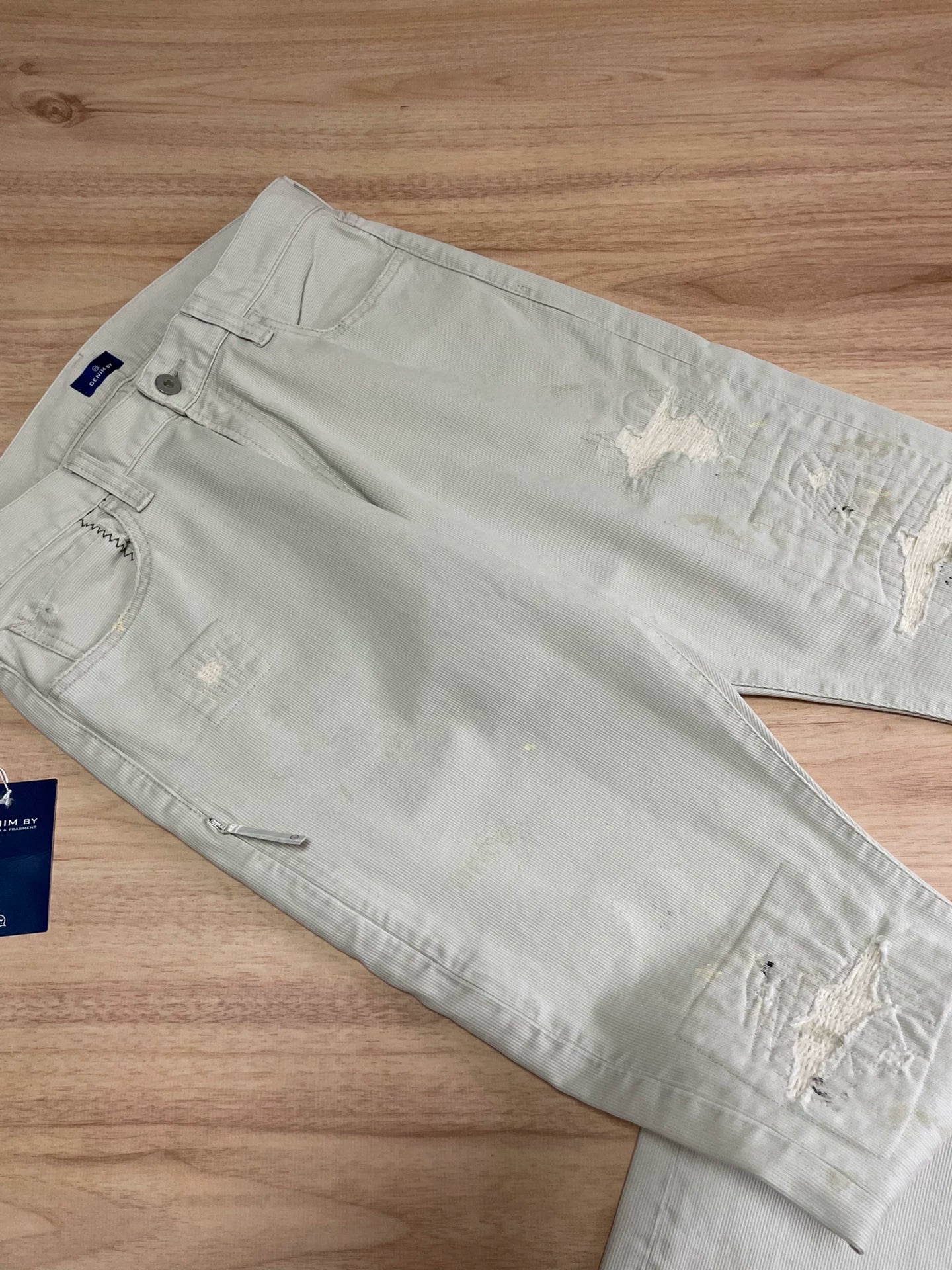 ivory corduroy pants with paint splatter