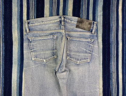 distressed raw wash denim jeans by fabric-brand&co