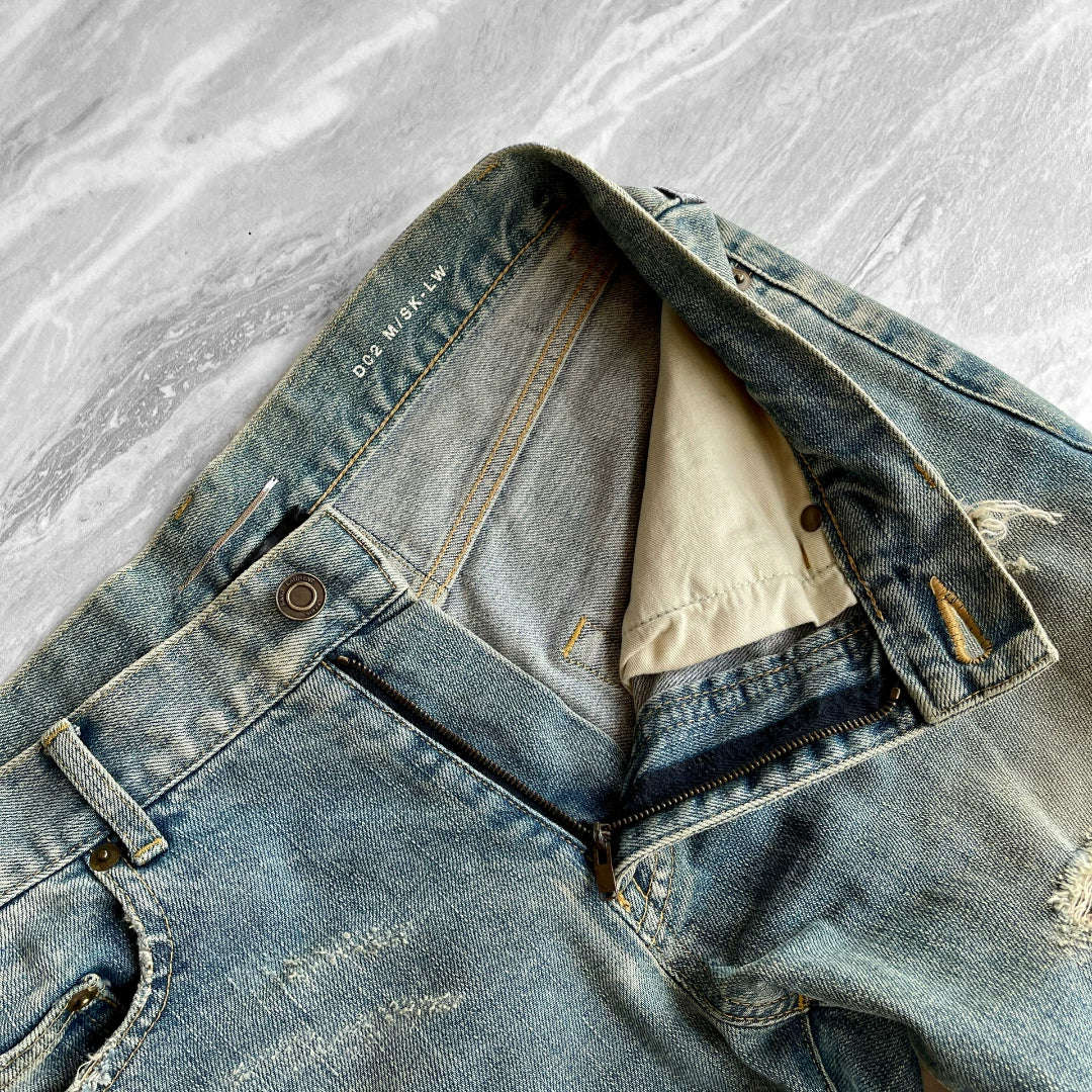 SAINT LAURENT Distressed Blue Jeans