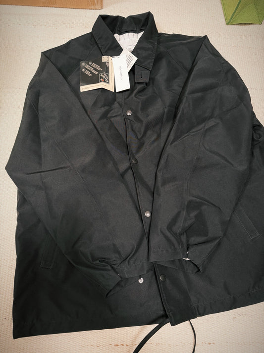 black gore-tex coach jacket by nanamica