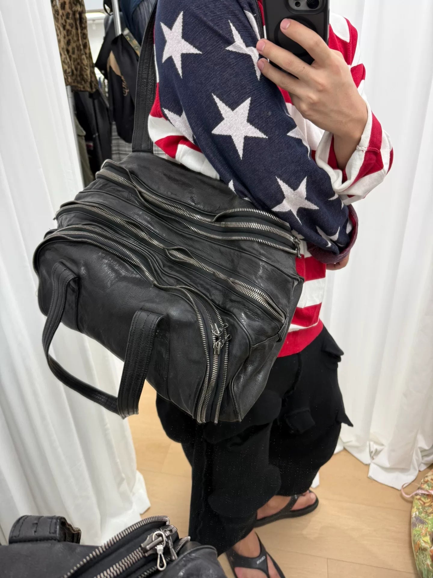 large black zippered handbag