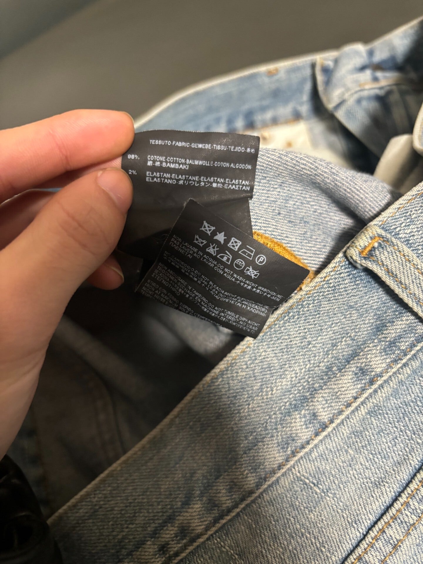 saint laurent ripped knee denim pants