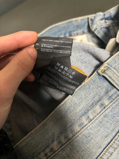 saint laurent ripped knee denim pants