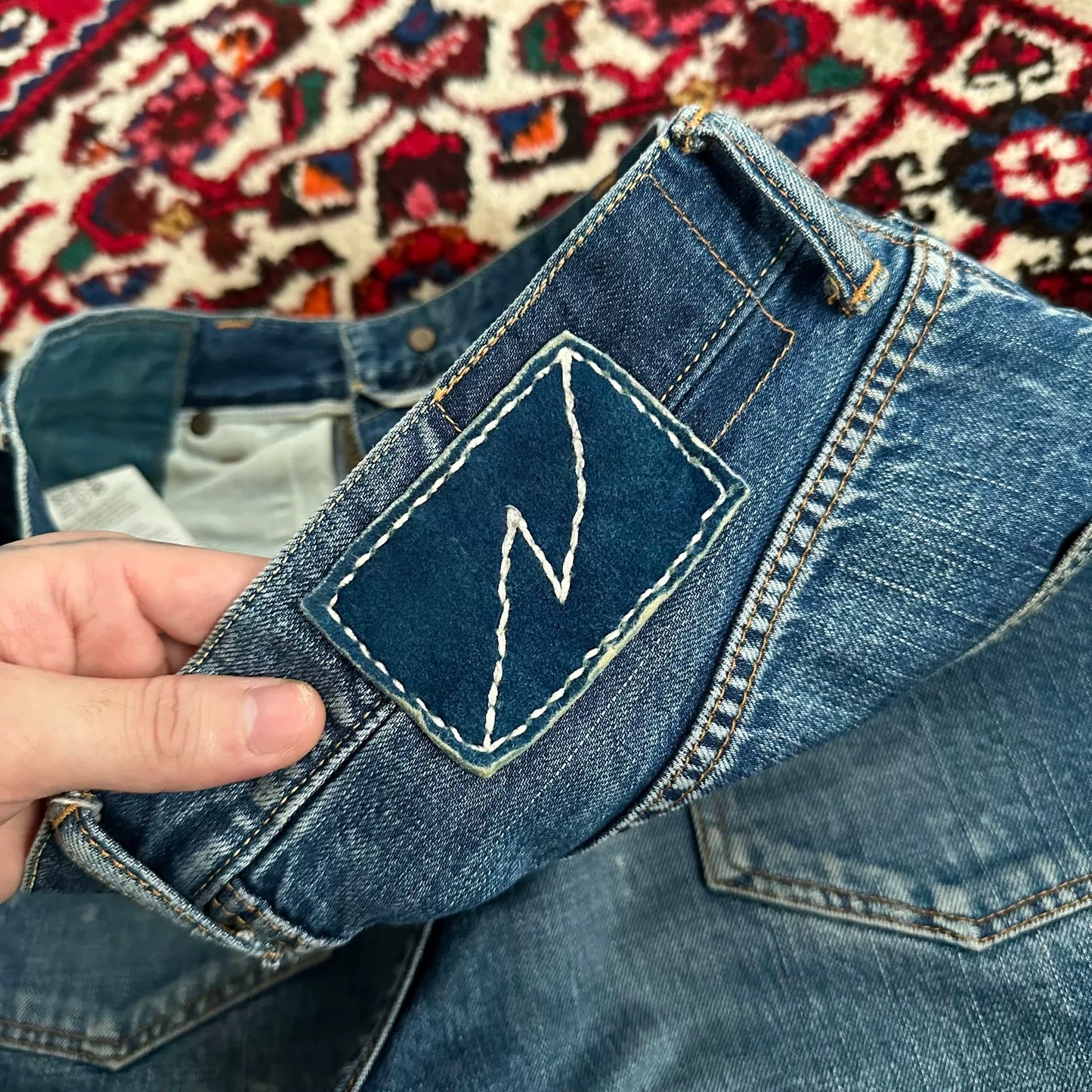 visvim mud-dyed wide-leg denim pants